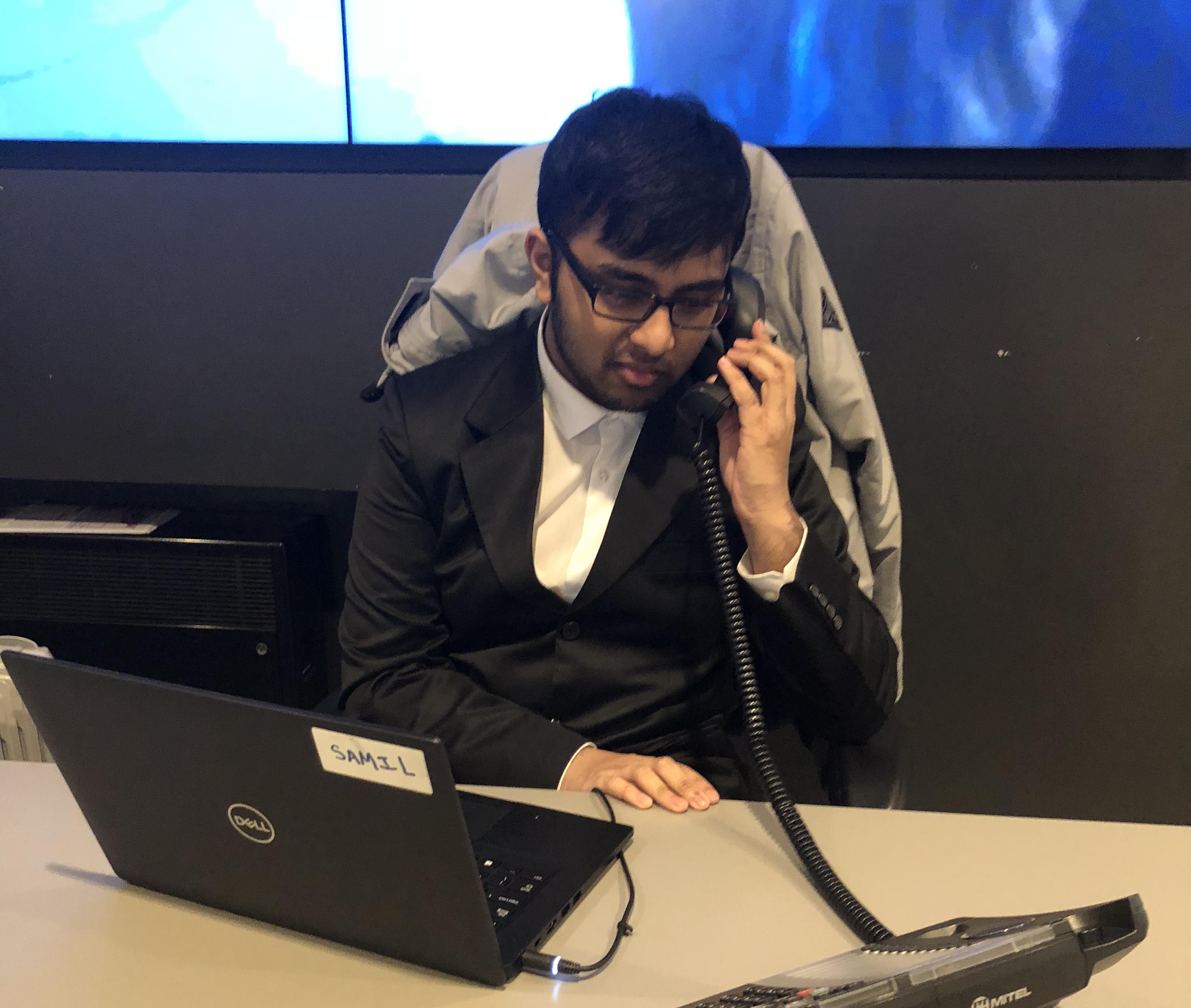 Intern Samil at the Queen Mary reception and help desk