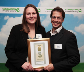 Emma Baker and Rik Husdan of Student and Campus Services collect Queen Mary's Good Egg Award.