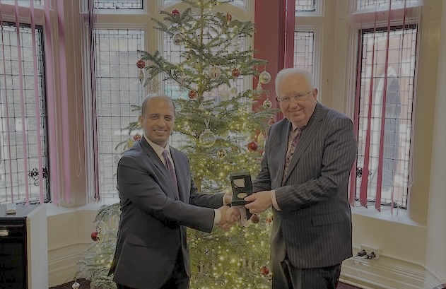 Professor Sir Mark Caulfield receives Kuwait medal