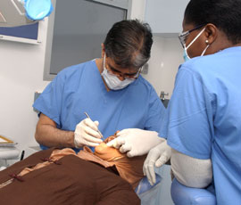 Dr Anand Lalli and patient