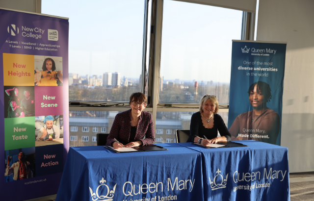 Two people signing MoU between Queen Mary and New City College