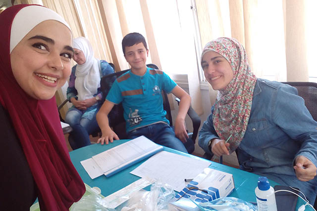 Youth participating in the study for the collection of hair samples. Credit: Taghyeer Organization