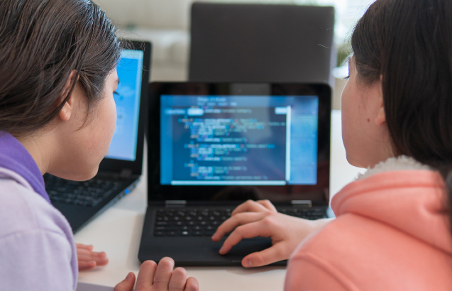 Girls learning to code. Credit:kaz_c/iStock.com