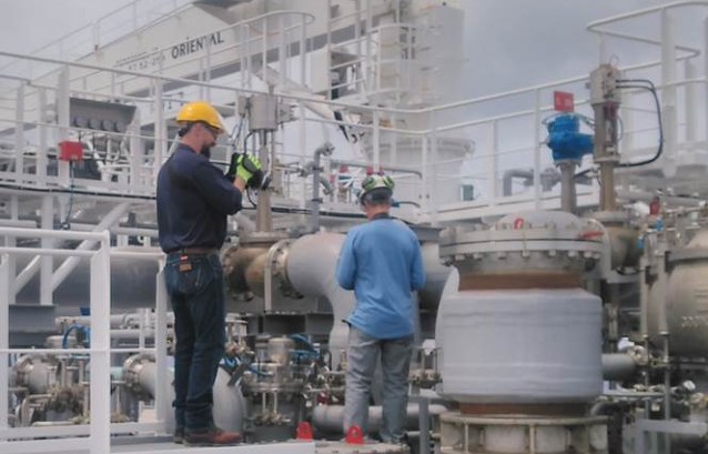 Dr Balcombe taking measurements onboard the Gaslog Galveston