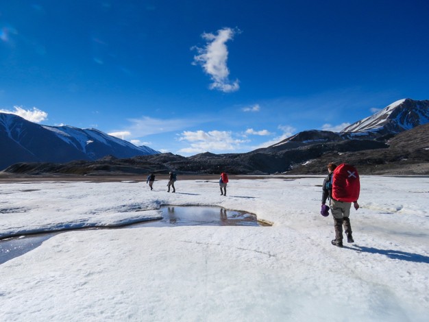 Because of polar bears, we spent our nights in Svalbard on the ship. This meant a daily hike to our sampling locations, carrying heavy equipment across treacherous terrain. Our polar bear guard came along to keep us safe while we worked.  Picture by Danielle Harris.