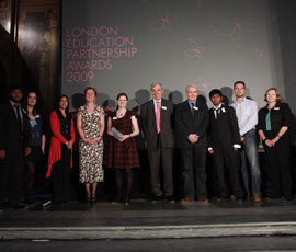 The winning team with their award