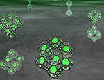 Artist impression of small clusters of silver atoms (green spheres) trapped in zeolite cages. Credit: Dr Oliver Fenwick