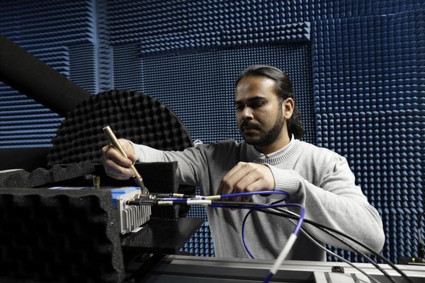 Man building a robotic arm