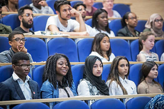 Queen Mary University of London students in a lecture theatre