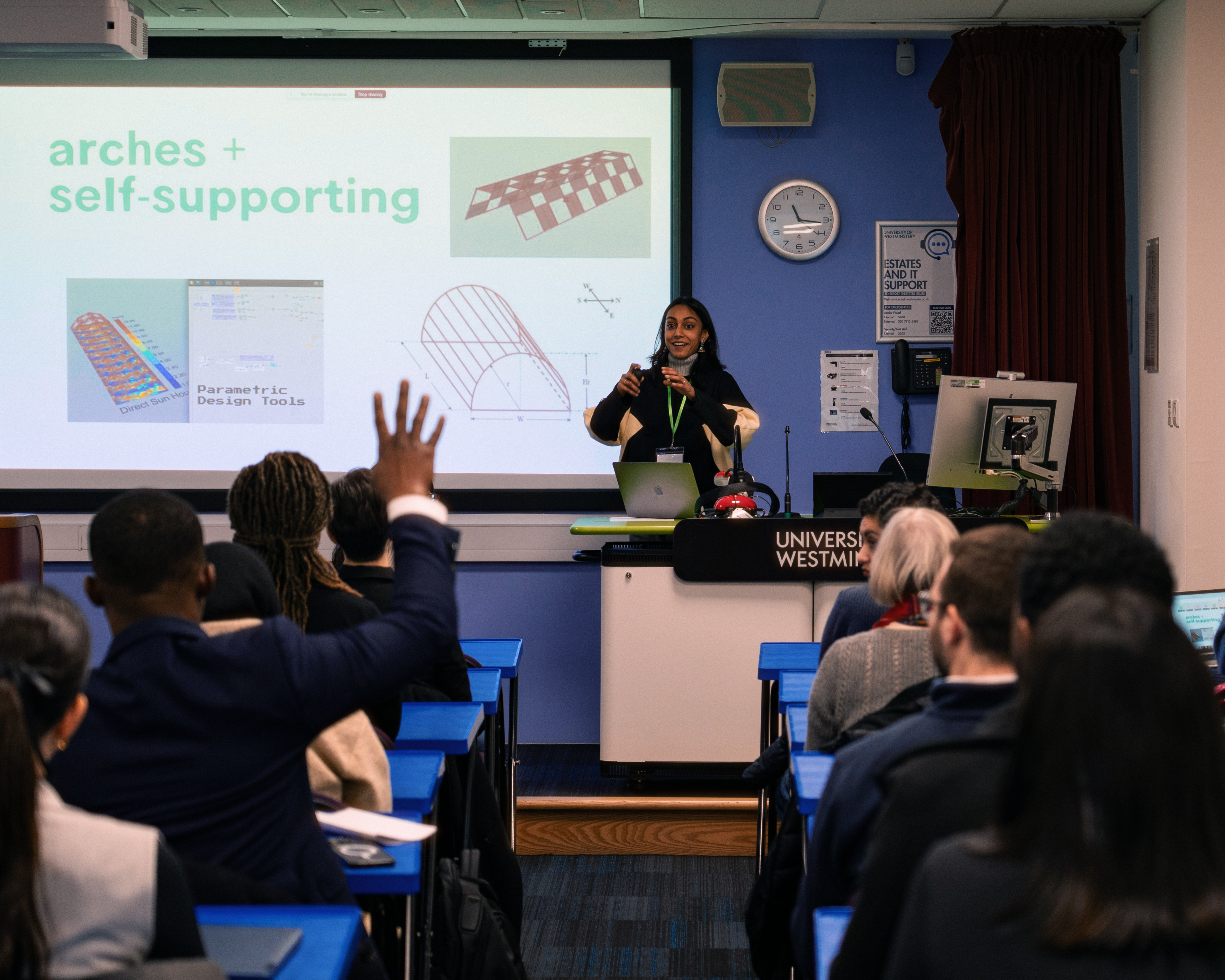 Student presenting their work at the event