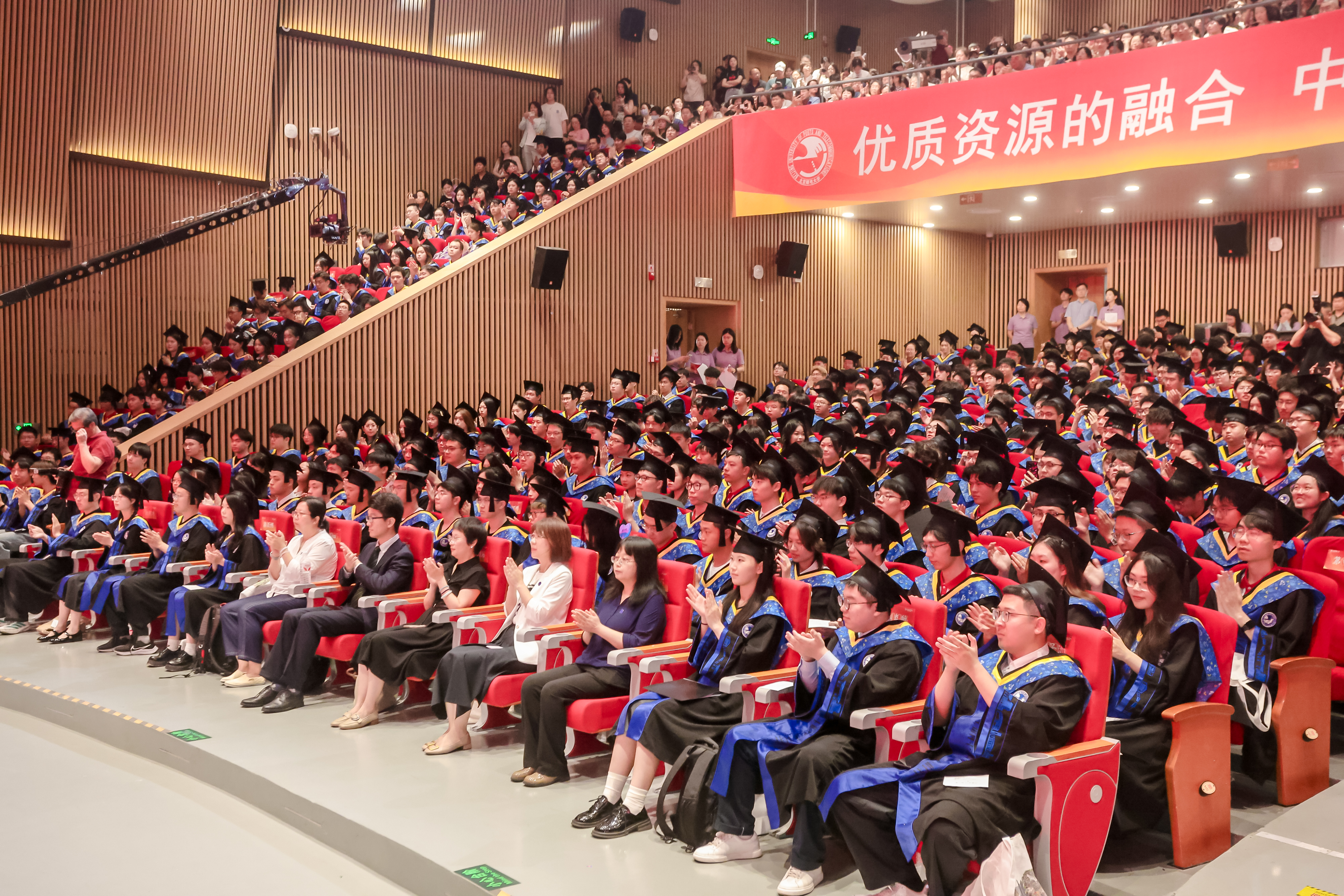 Student graduation at Beijing University of Posts and Telecommunications (BUPT).