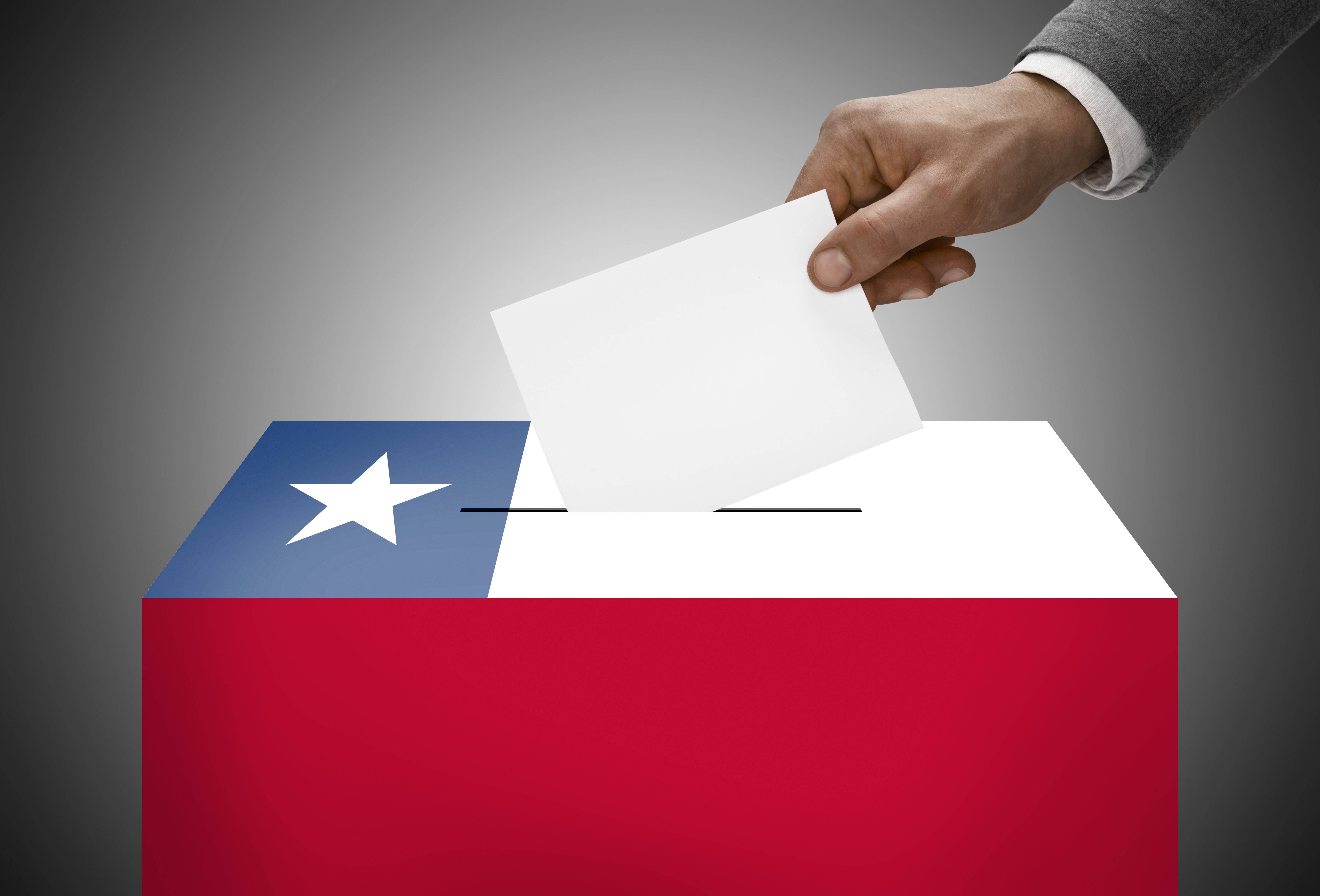 A ballot box painted into national flag colours of Chile.