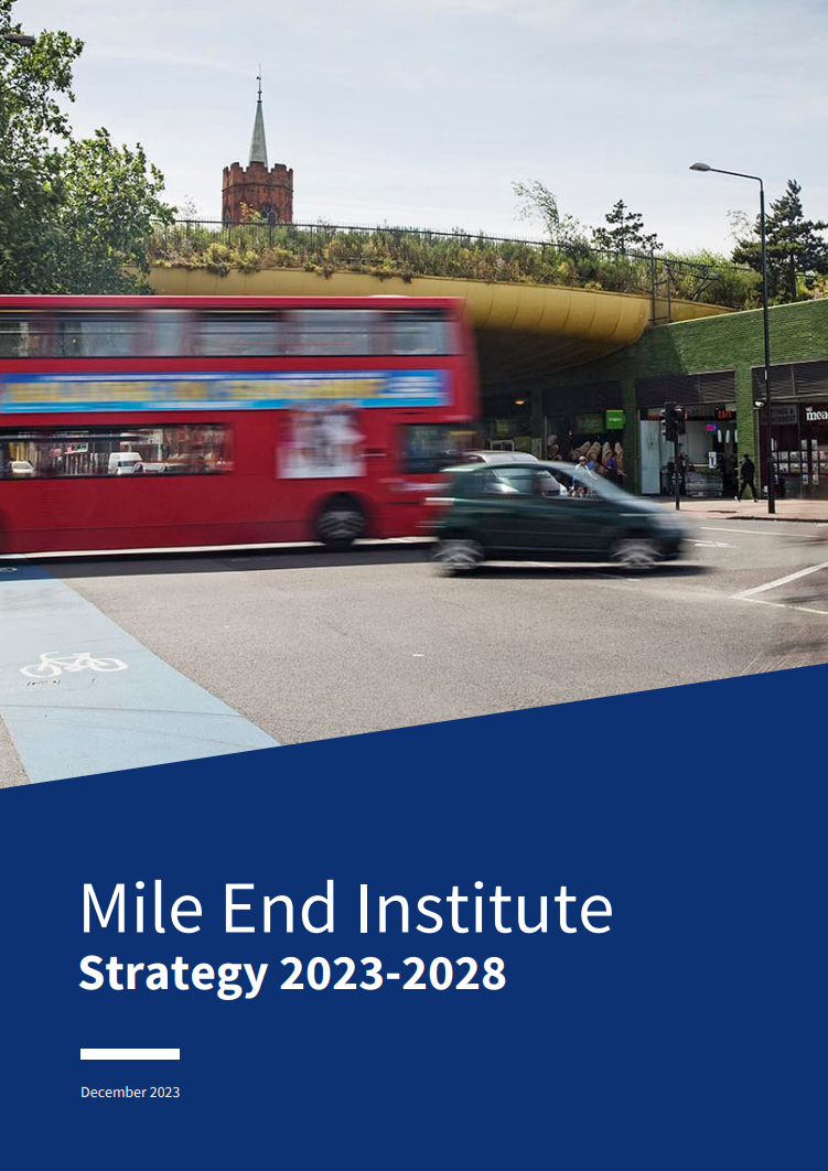 A photo of a bus and car crossing the Mile End intersection