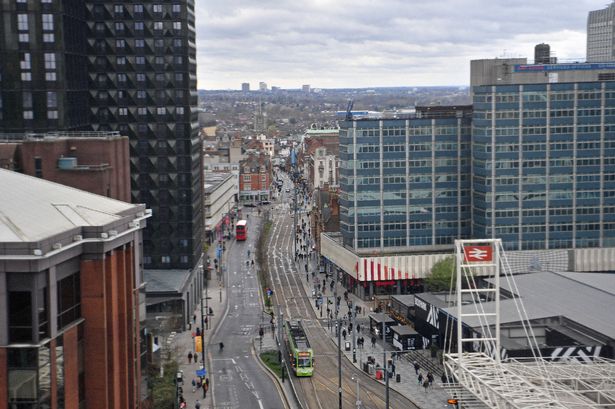 Photo of Croydon from the air including train station