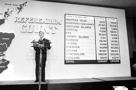 Photo of Ronald Fraser delivering the results of the 1979 referendum at St Andrew's House in Edinburgh.