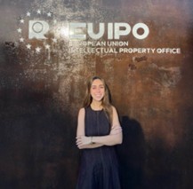 Mariam Marcos Zabalza stood by the EUIPO sign in their building.