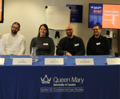 In-house lawyers sat together on the panel smiling.