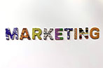 The word 'Marketing' written out in capitals, with each letter a different colour and pattern