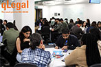 A table of qLegal students sat around a table in a workshop about clinical legal education.