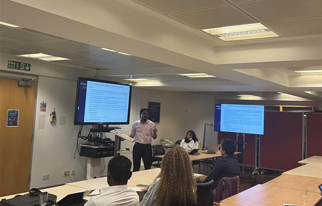 A qLegal student giving a workshop on Protecting Your Intellectual Property When Working with Others