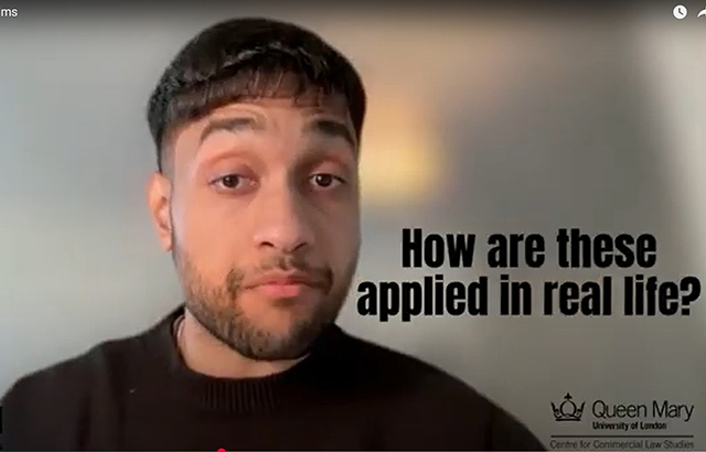 qLegal student speaking to camera in a video.