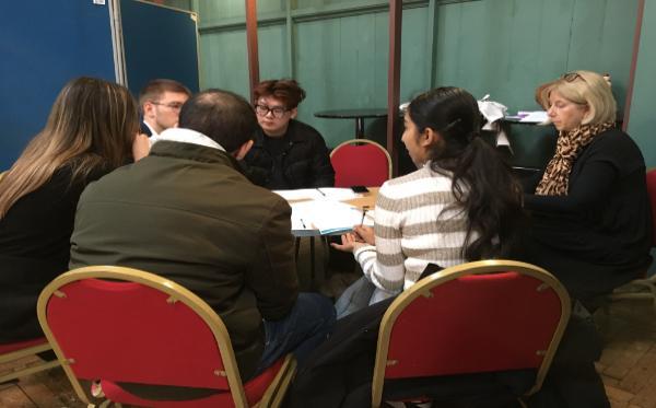 A group of students sitting at the table 