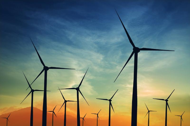 Wind turbines in a green field