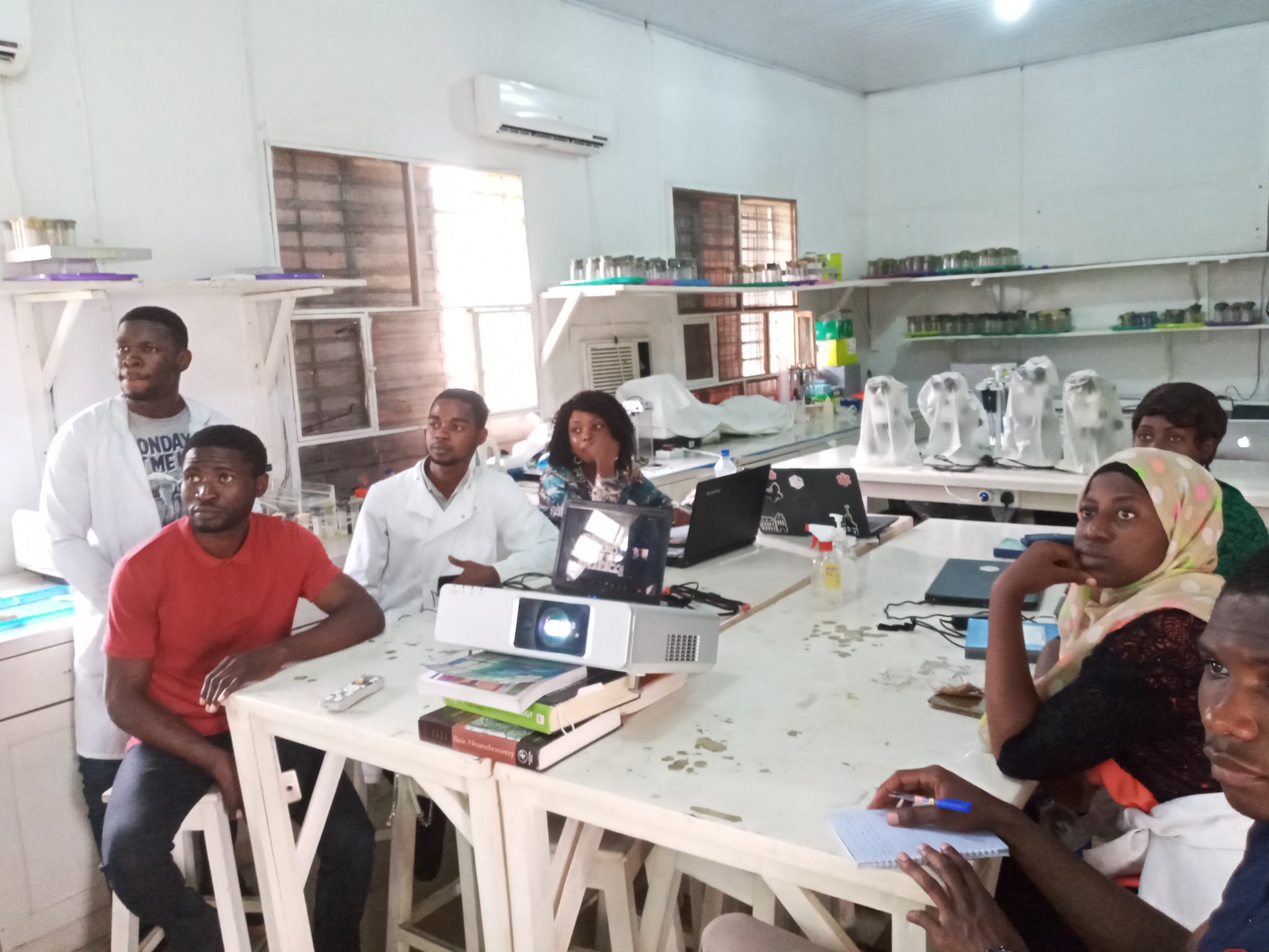 researchers sitting around table