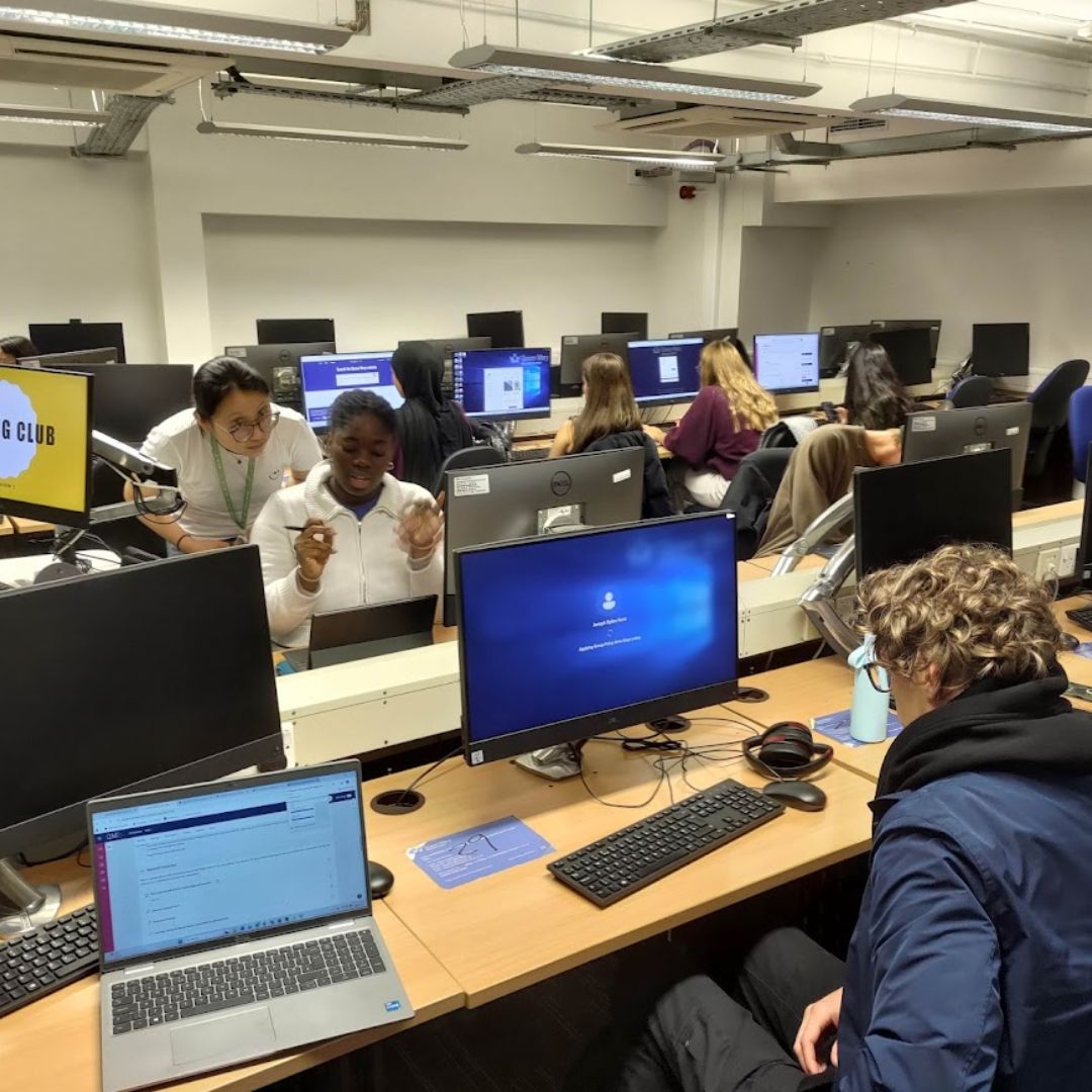Students logging into computers during Coding Club