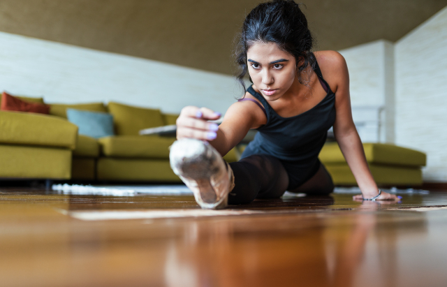 female ballerina stretching