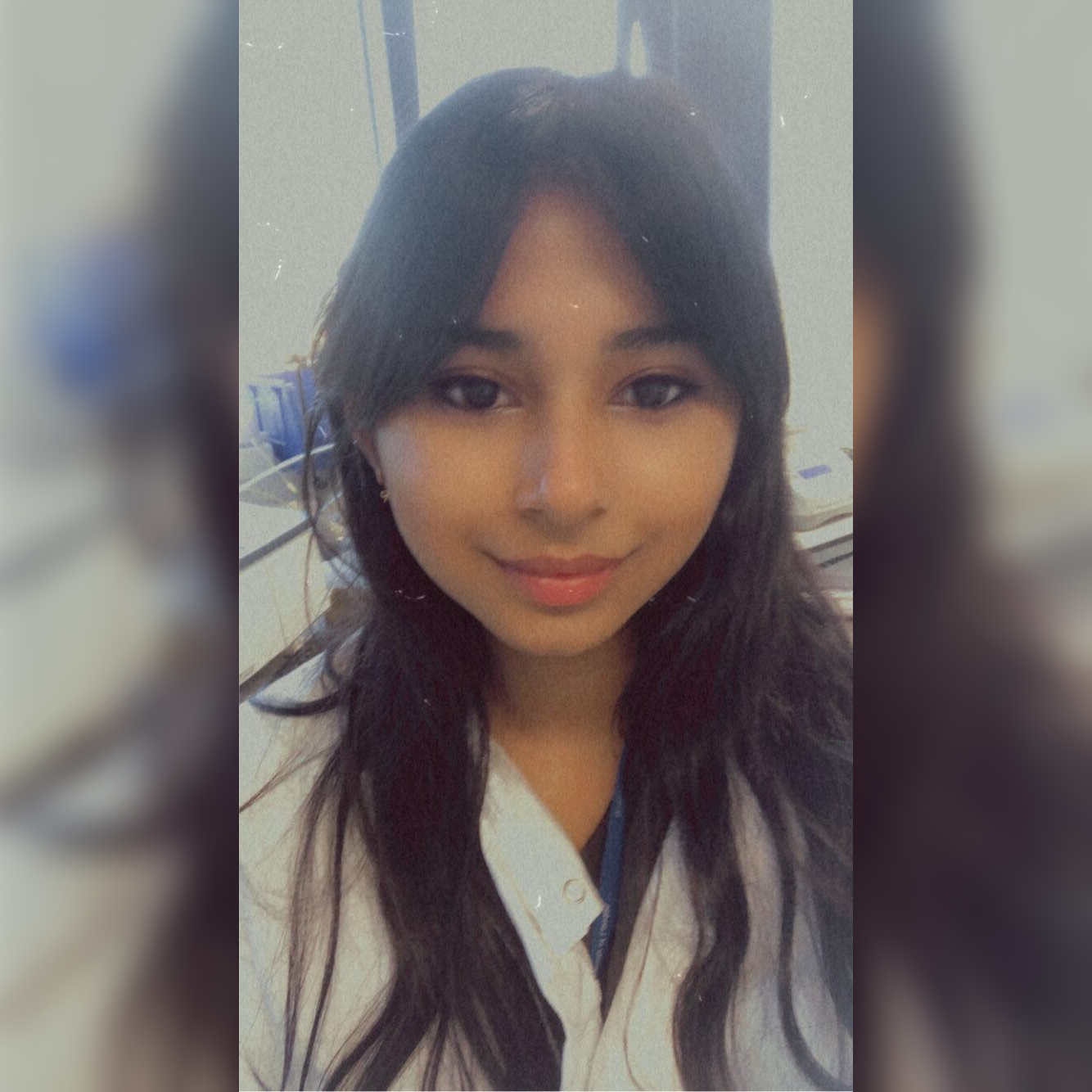 A female student in lab coat