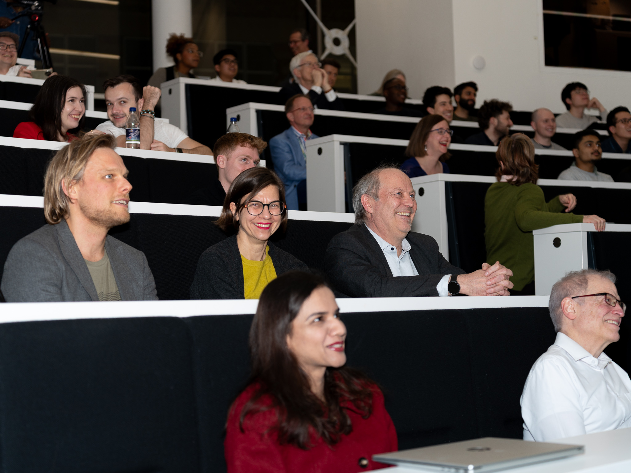 Staff and students sitting in the Peston lecture theatre