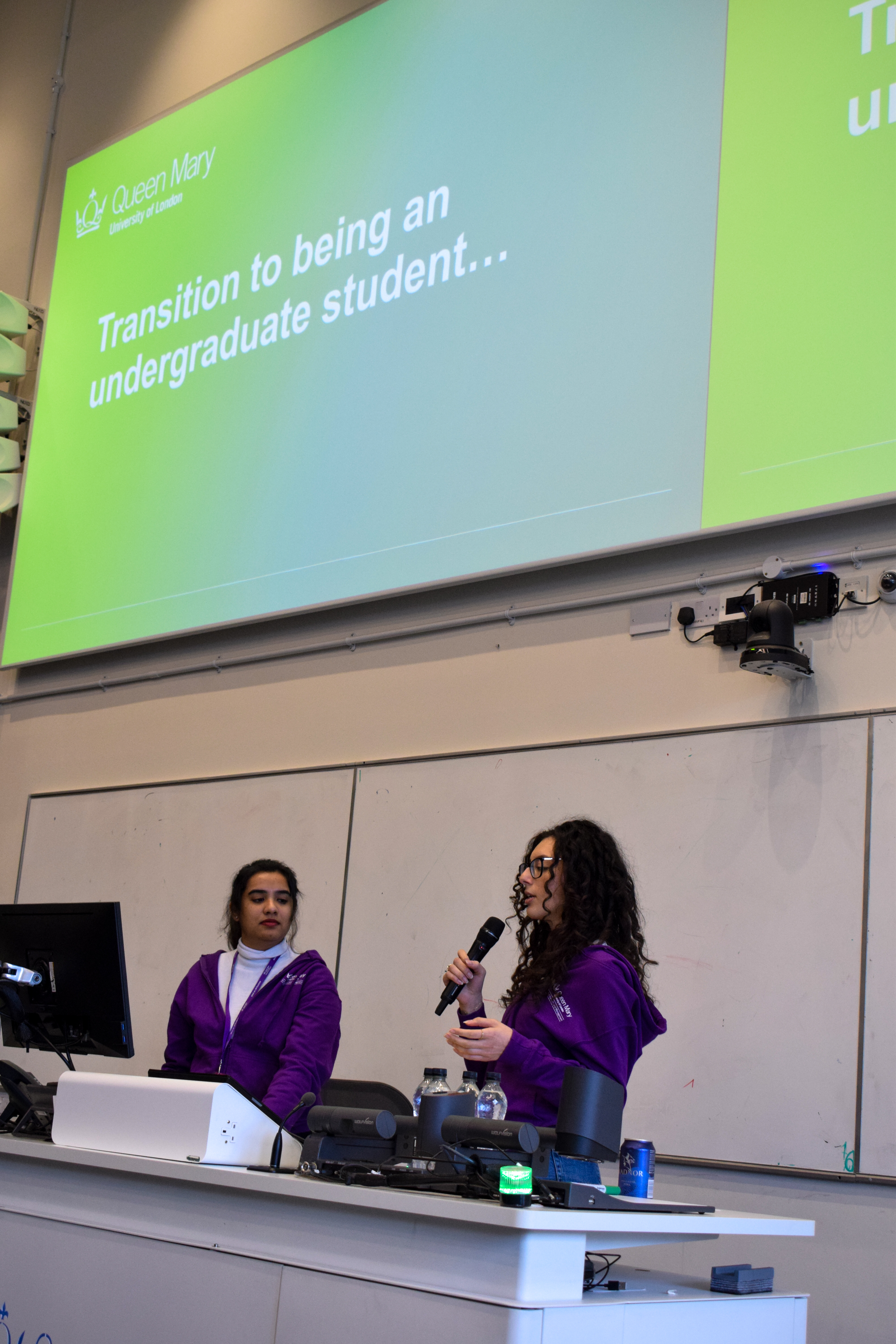 Queen Mary students giving a presentation
