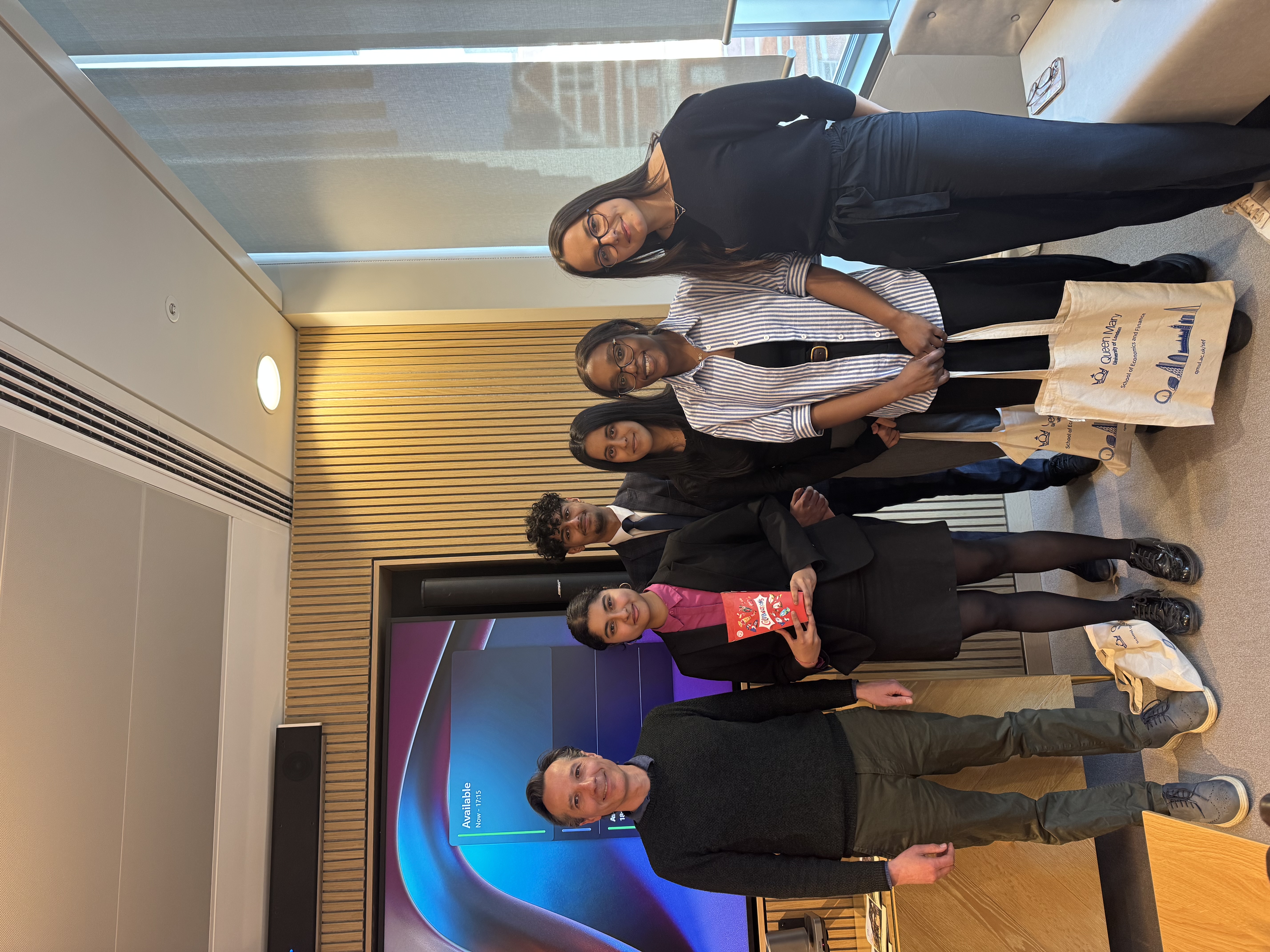 image of qNomics students celebrating their achievements