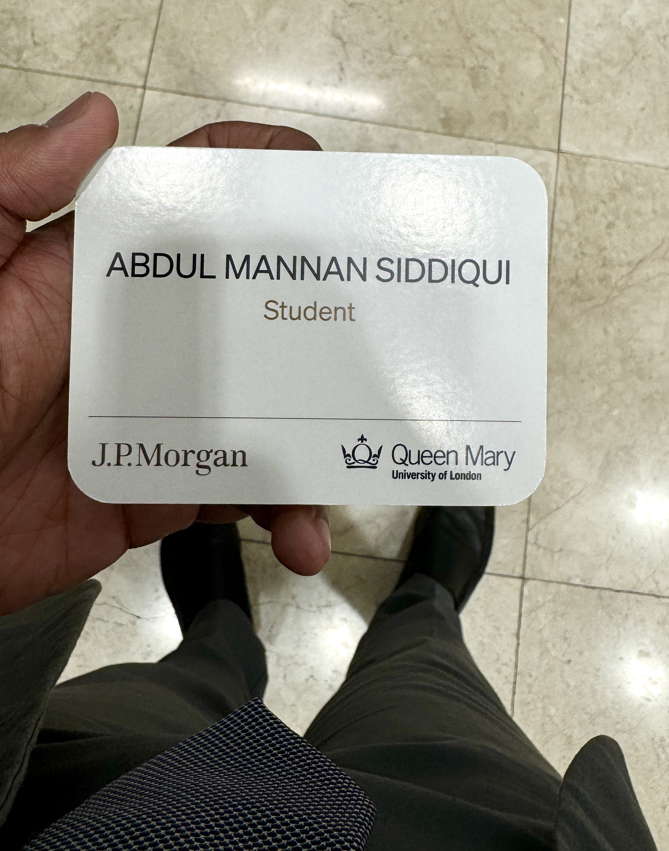 Name badge from JP Morgan event