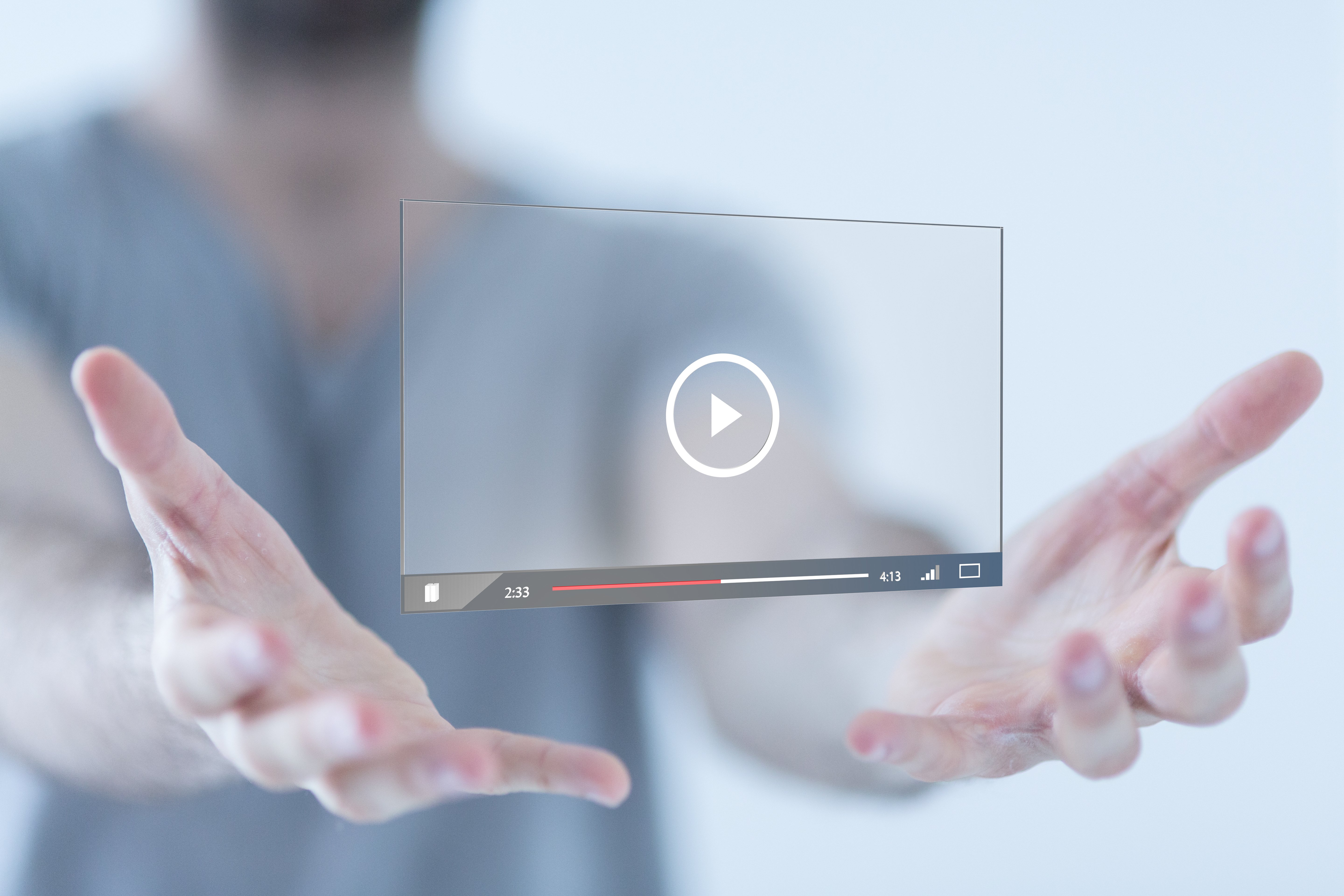 Outline of an invisible video screen hovering above someones hands