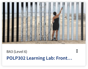 A lady in a black dress is painting a black fence white.