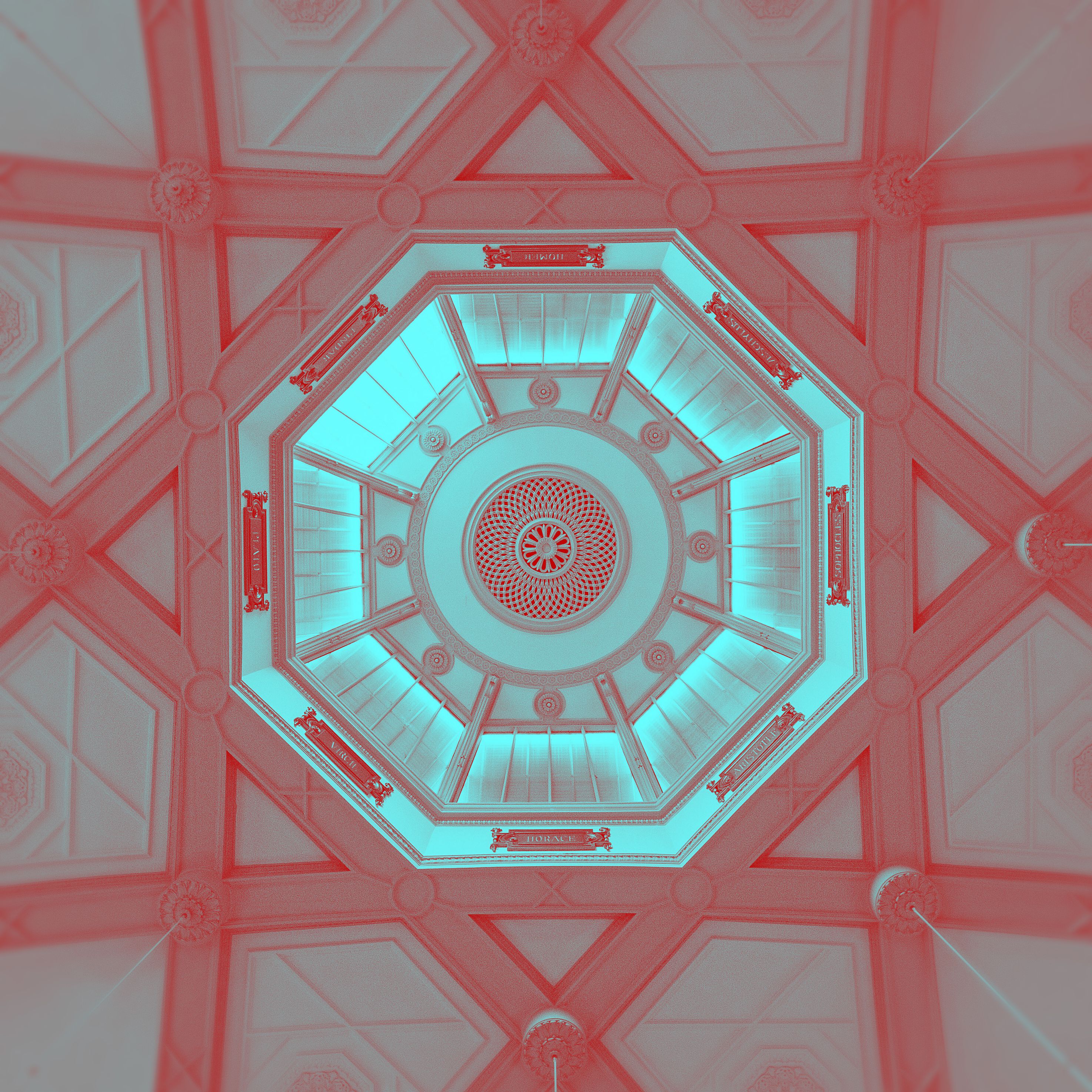 Image of a magical gemstone. The stone is light blue. Around it are shapes with red lines and white centers.