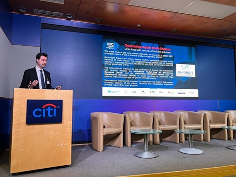 William Brydie-Watson speaking on stage at the conference.