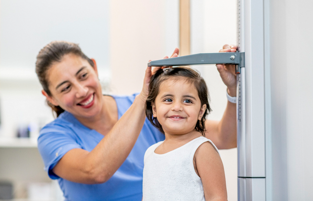 Child being measured